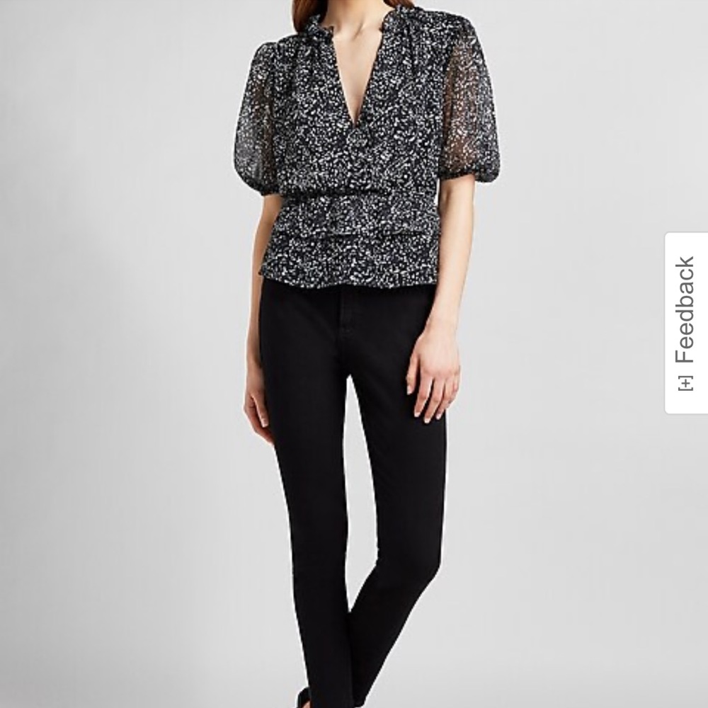 New with tags Express Printed Wrap Front Peplum Top